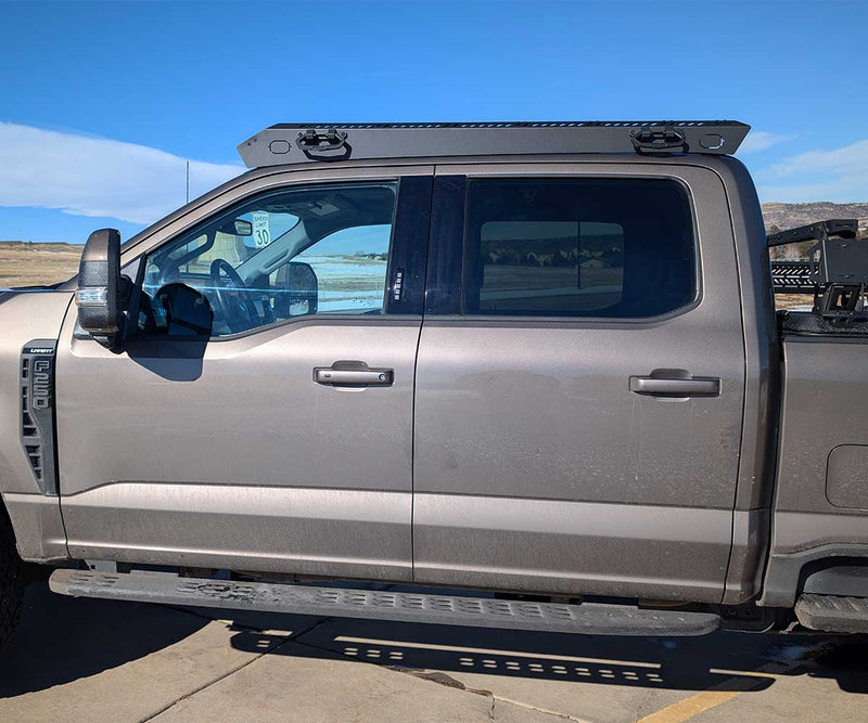 Load image into Gallery viewer, Kilo 5G F250 roof rack on 2020-2026 Ford Super Duty truck, low-profile black aluminum design
